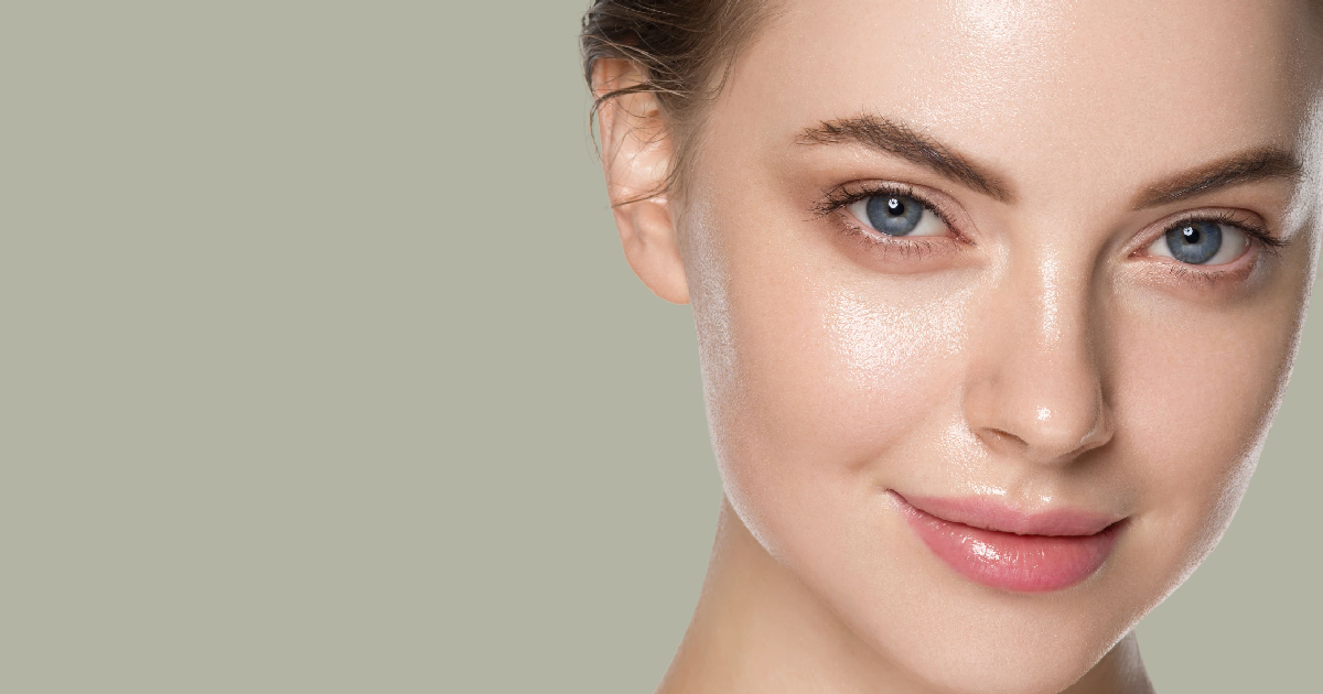 Close-up of a woman with smooth, glowing skin after HydraFacial treatment in Akron, OH.