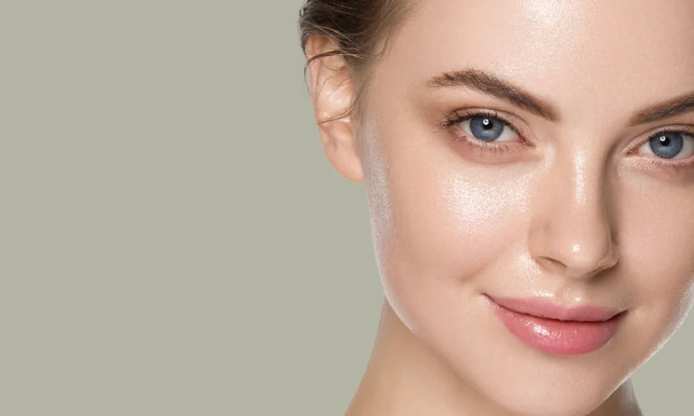 Close-up of a woman with smooth, glowing skin after HydraFacial treatment in Akron, OH.
